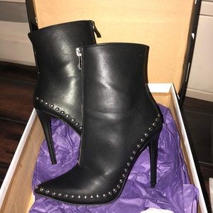Black studded heeled boots